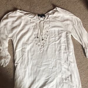 White dress with macrame detailing